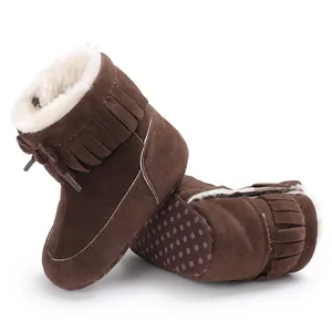 Detailed view of brown baby winter snow boots with fleece lining and anti-slip soft sole