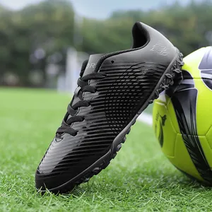 Scarpe da calcio professionali nere per bambini per allenamento all'aperto
