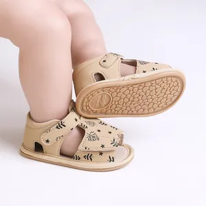Close-up of infant beach sandals featuring a soft non-slip sole and star print