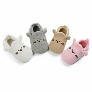 Four pairs of cute cartoon baby walker shoes with cat ears and soft soles in various colors