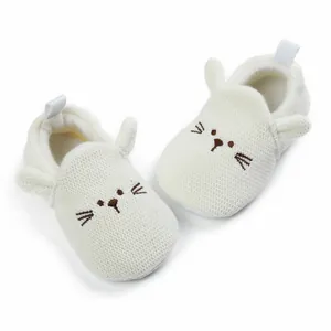 Cute white knitted baby walking shoes with cartoon cat face and soft ears design