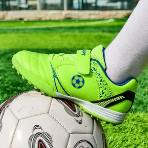 Leuchtend lindgrüne Kinder-Fußballschuhe mit Noppen für Training und Wettkämpfe
