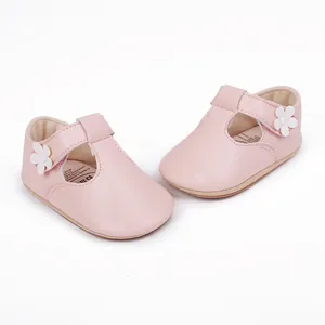 Pink baby girl princess shoes with white flower detail and comfortable T-strap closure