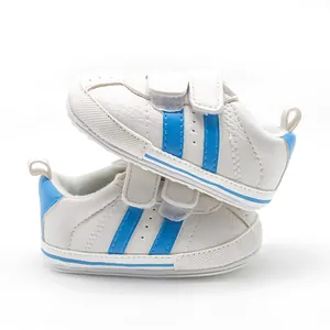 Breathable white baby walking shoes with blue stripes and non-slip rubber soles