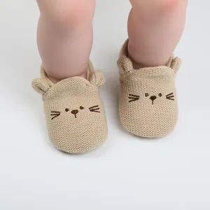 Adorable knit baby walker shoes with cute cat face embroidery and 3D ears detail