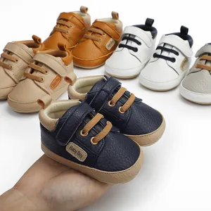 Close-up of stylish faux leather baby pre-walker shoes in multiple colors for infants