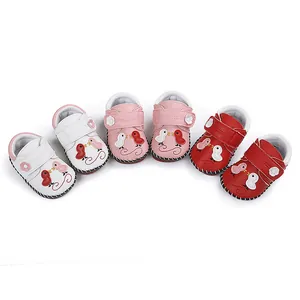 Zapatos de aprendizaje para bebés hechos a mano en cuero con motivos de dibujos animados