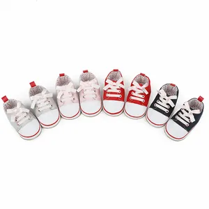 Detail view of colorful canvas baby walking shoes in multiple colors for 0-1 year olds