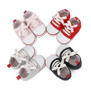 Assorted colors of baby girl walker shoes with ribbon laces for infants 0-1 years old