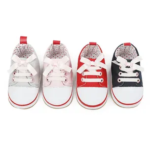 Cute infant baby girls' soft-sole bowknot walker sneakers in grey, pink, red, and blue