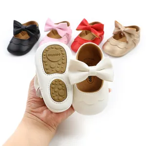 Detailed view of baby PU leather princess shoes with large bows and non-slip soft soles.