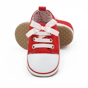 Red and white baby girl walker shoes with pink bow detail for infants aged 0-1 year.
