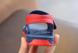 Detail view showing the durable red and blue heel and sole of children's sandals.