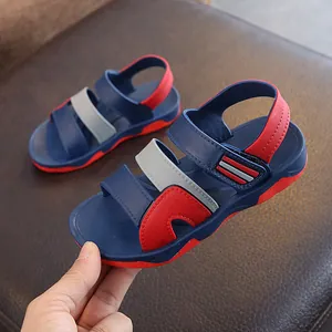 Comfortable boys sporty beach sandals featuring color-block navy, red, and grey design