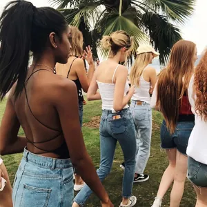 Sexy backless lace-up bodysuit for women in summer outdoor lifestyle setting