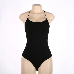 High-quality detail of a sexy backless black halter neck bodysuit displayed on a mannequin.