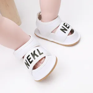 White infant summer sandals with NEKL print for baby boys and girls walker shoes