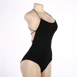 Detailed view of a sexy black backless bodysuit featuring thin cross-back straps on a mannequin