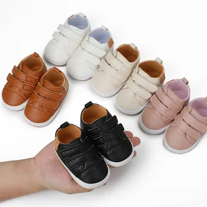 Detail of soft PU leather baby walking shoes with velcro straps in multiple colors
