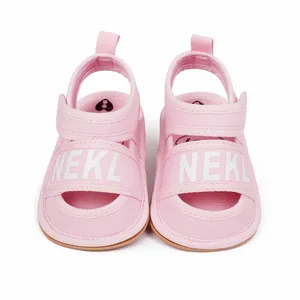 Pink infant summer sandals with adjustable hook and loop straps for 0-1 year olds