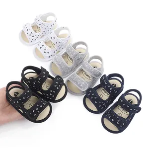 Soft-soled baby sandals with geometric triangle patterns in multiple colors, soft baby shoes.