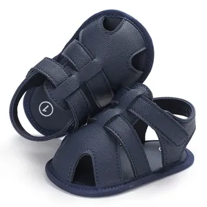 Sandales en cuir PU bleu foncé à semelle souple pour bébés et tout-petits de 0 à 1 an.