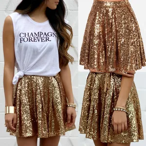 Fashionable women's gold sequin pleated mini skirt perfect for glamour party outfits