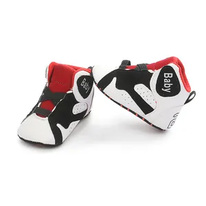 Detailed view of red black white baby basketball walker shoes with soft anti-slip sole
