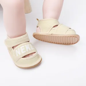 Detailed view of beige breathable mesh baby walker sandals with easy velcro straps