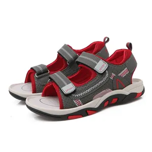 Sporty gray and red children's sandals with breathable mesh and triple velcro straps.