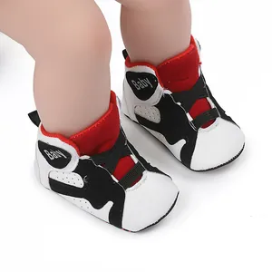 Red and black baby basketball shoes with soft non-slip soles for toddlers' first steps