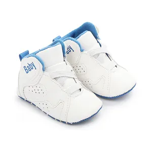 Close-up of white baby basketball shoes with blue accents and soft anti-slip soles