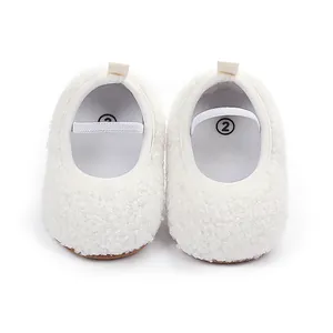 Comfortable white fuzzy fleece baby walking shoes with elastic strap and size 2