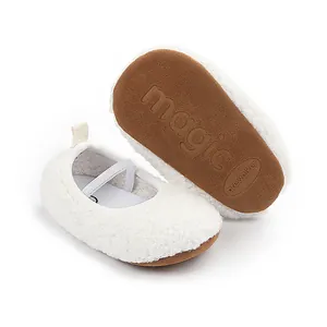 Close-up detail of anti-slip rubber sole and soft fleece material on baby walker shoes