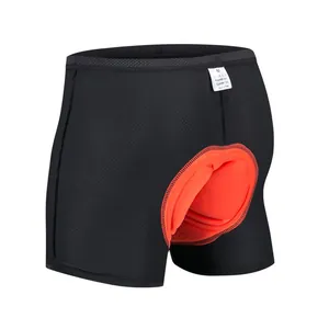 Detalle de ropa interior de ciclismo negra transpirable con badana naranja acolchada