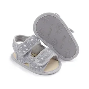 Summer baby pre-walker sandals in grey with white triangle patterns and soft anti-slip sole