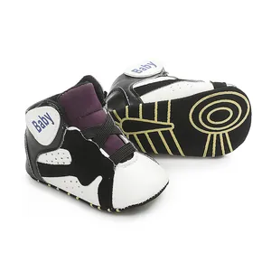 Close-up of baby basketball shoes showing the soft anti-slip sole and side profile