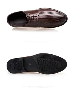 Vue détaillée de chaussures de ville marron perforées en cuir avec lacets et semelle