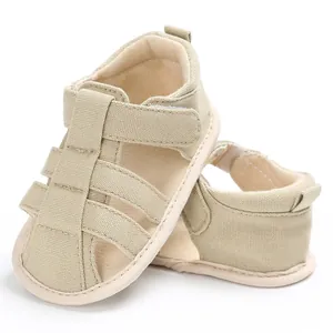 Close-up view of khaki baby boy closed-toe sandals with soft anti-slip soles for walking