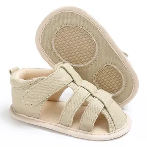 Detailed view of breathable beige baby sandals with soft anti-slip rubber soles