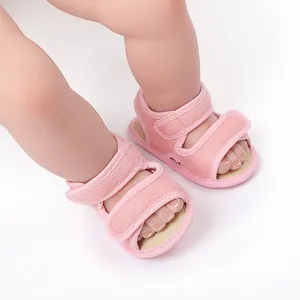 Close-up of pink breathable mesh baby walking shoes with adjustable straps