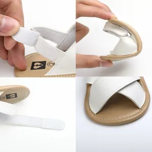Detailed view of baby soft sole walking sandals showing flexible sole and velcro strap closure