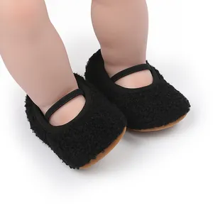 Fuzzy black Mary Jane baby toddler shoes with elastic strap and soft sole