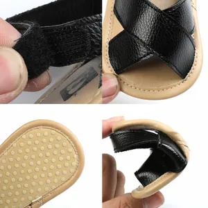 Detail view of baby walking sandals showing velcro strap and flexible non-slip sole