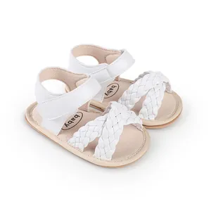 Stylish white woven baby sandals with secure velcro straps for infant girls walking