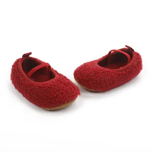 Detailed view of cozy red sherpa fleece baby Mary Jane shoes with elastic straps