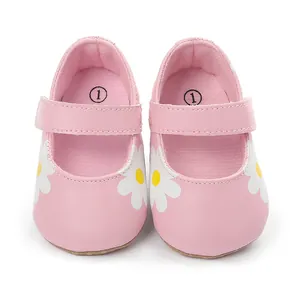 High-quality pink baby walking shoes featuring white daisy patterns and velcro strap