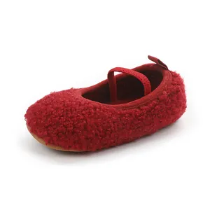 Detailed close-up showing the soft red plush texture of a baby toddler walking shoe