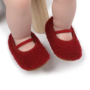 Detailed view of red fuzzy baby Mary Jane shoes with elastic strap for pre-walkers.