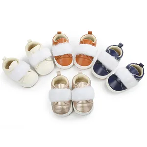 Detailed view of baby walking shoes with plush trim in multiple colors and soft soles